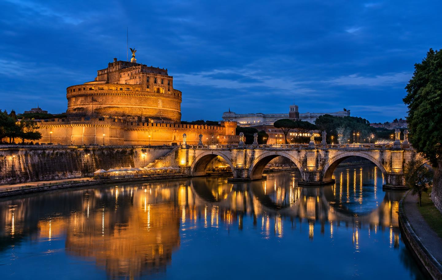 Castel Sant'Angelo and the Tiber in Rome at blue hour